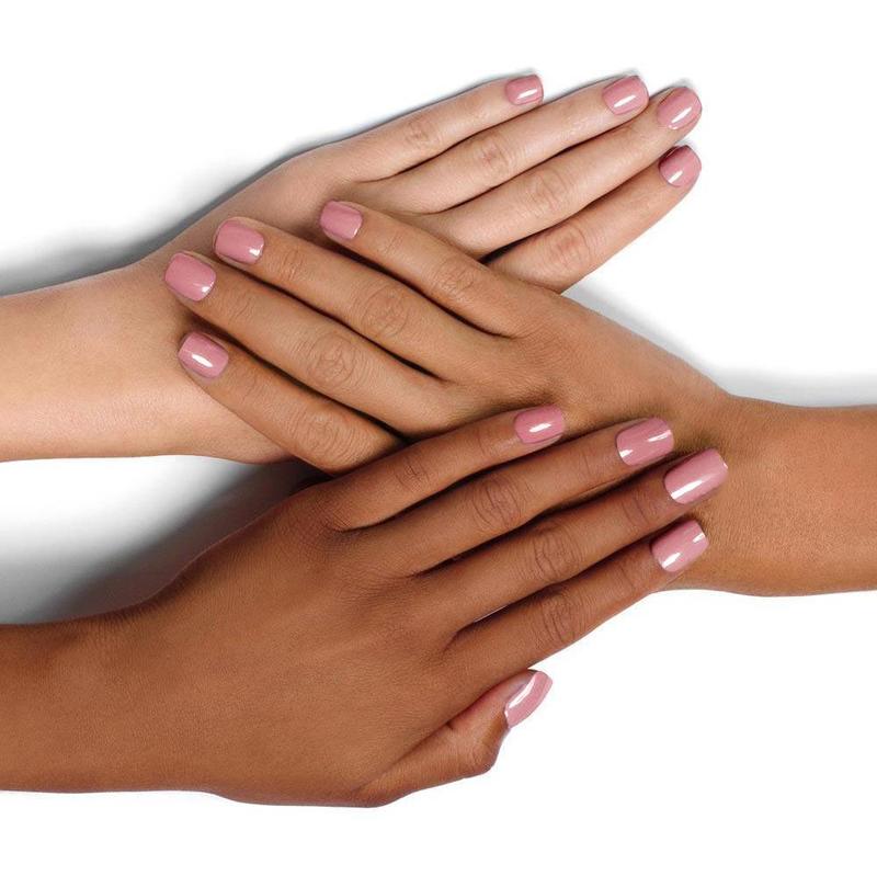 Diverse Hands with Agatha Ruiz de la Prada Nail Polish on Nails Light Pink