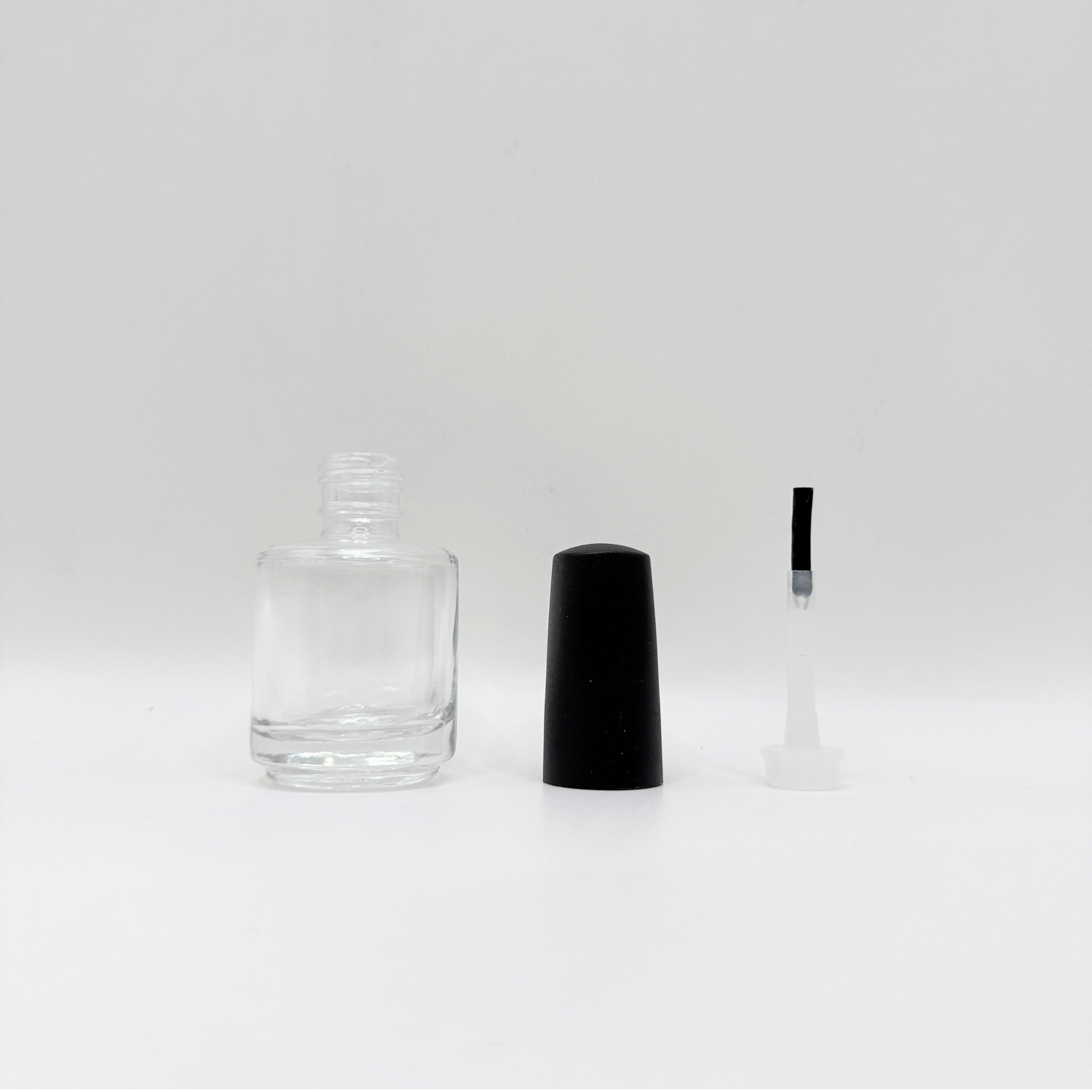 511_ROUND_BOTTLE_MATTE_BLACK_CAP_FLAT_BRUSH.png