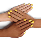 Diverse Hands with Agatha Ruiz de la Prada Nail Polish on Nails Pastel Yellow