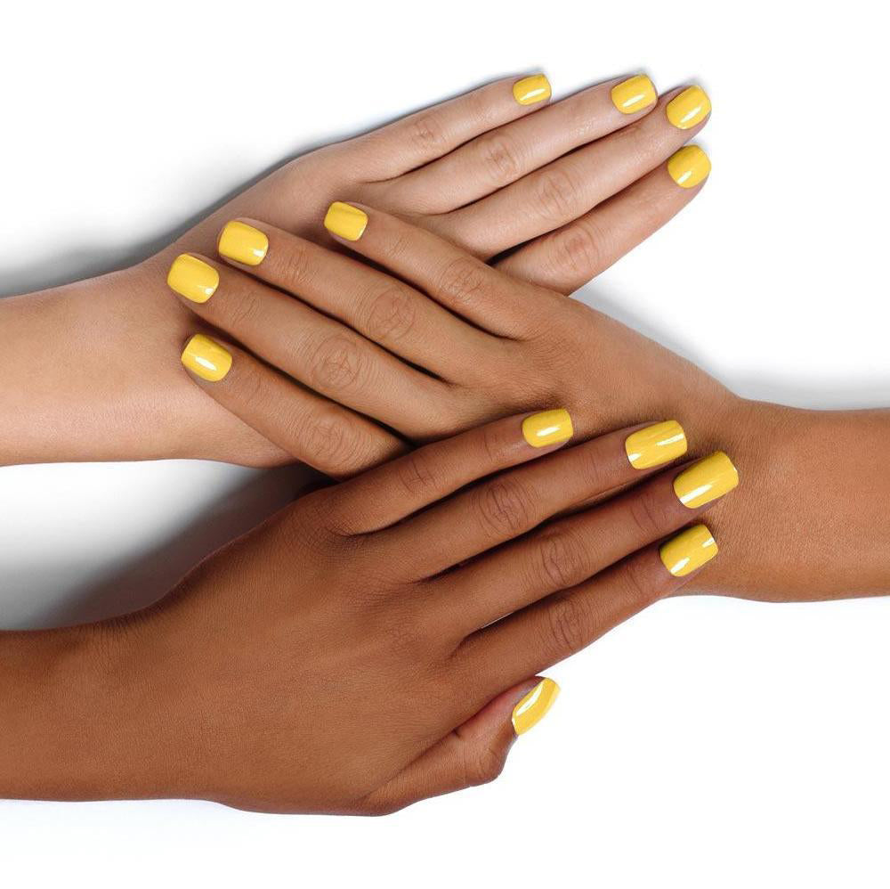 Diverse Hands with Agatha Ruiz de la Prada Nail Polish on Nails Pastel Yellow